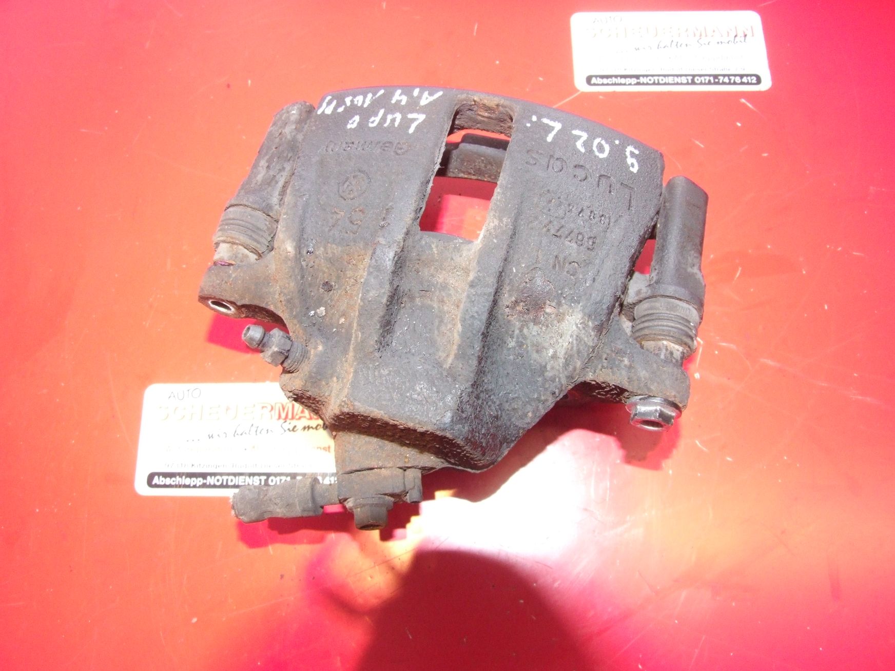 Bremssattel aus VW Lupo Lucas / 6N0615123C (gebraucht)