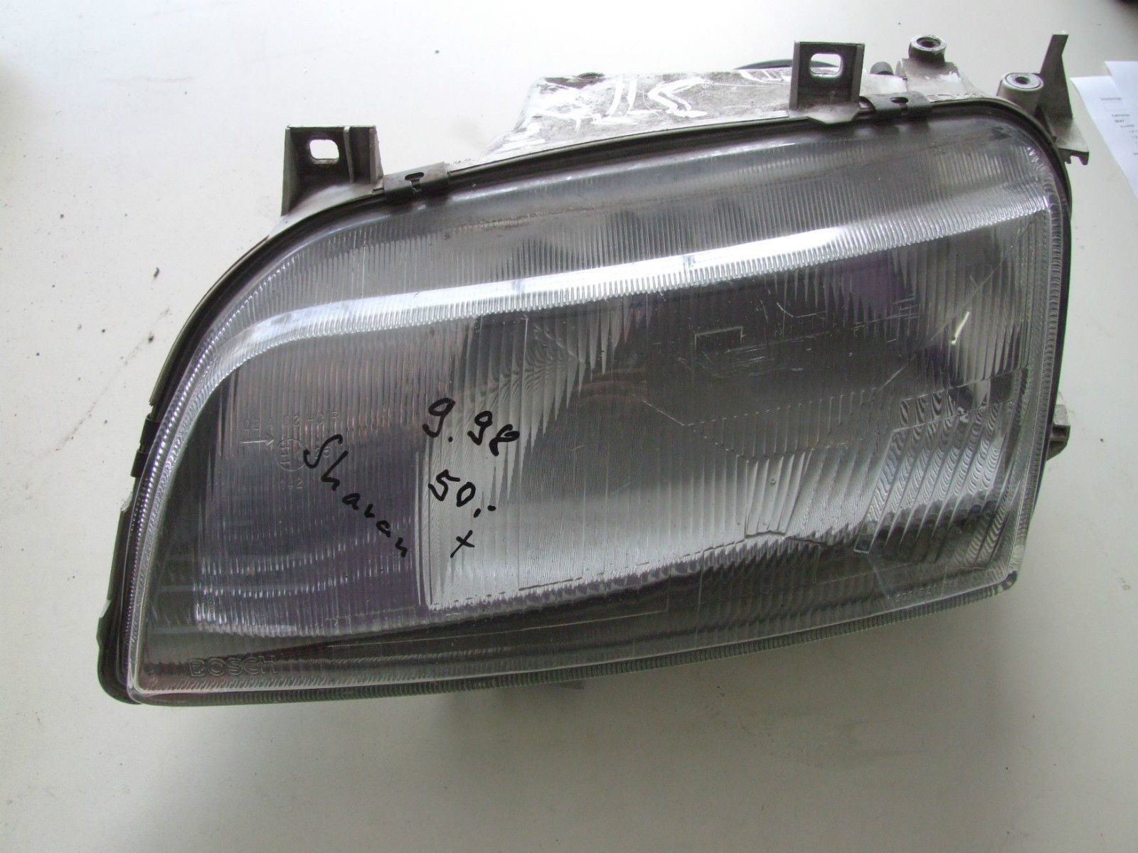 Scheinwerfer aus VW Sharan Bosch 0301048302 / 7M1941016D (gebraucht)